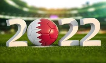 Qatar 2022 World Cup sign with Qatar flag image on football