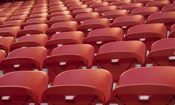 Empty red seats in a stadium